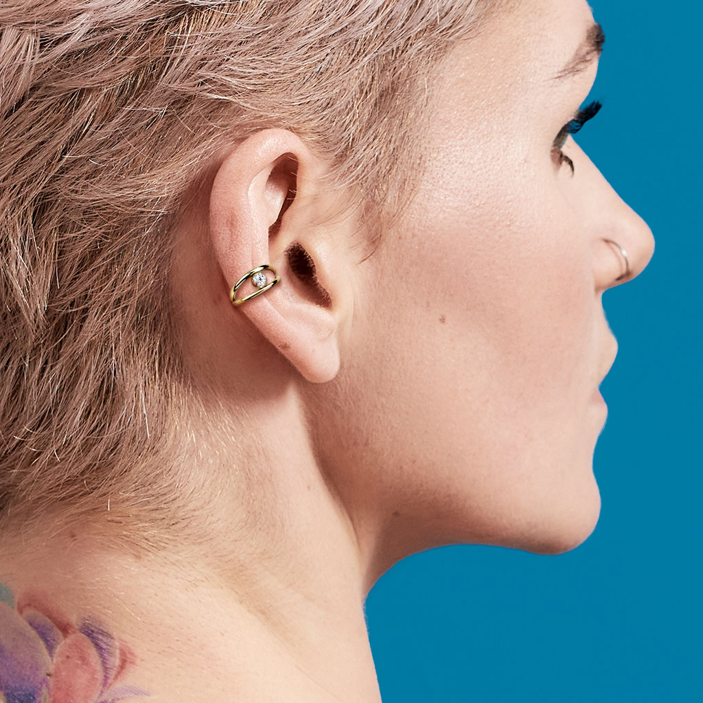 Anneau acier doré avec strass pour piercing de conch
