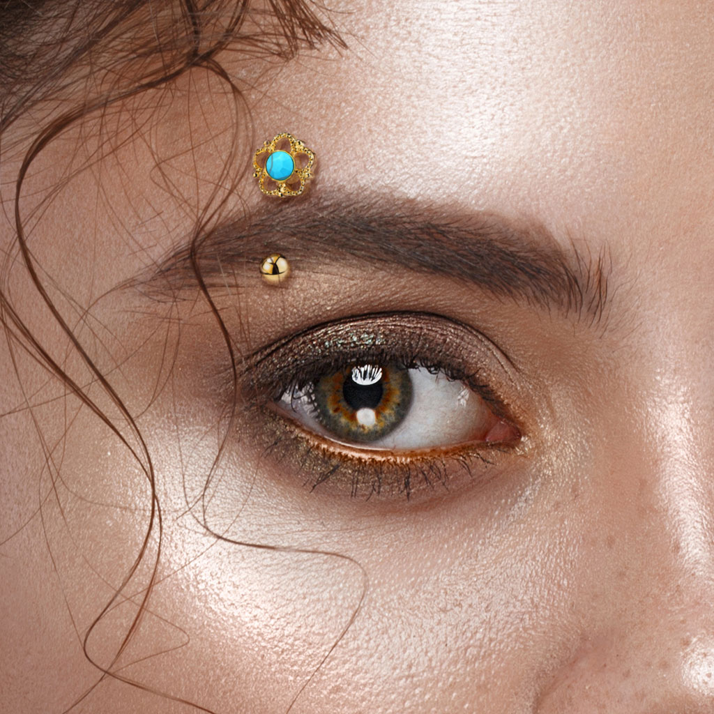 Piercing d'arcade pour femme - Bijou en acier chirurgical doré serti d'une pierre turquoise